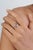 This modern bypass toi et moi Ring featuring 1 carat pear and oval cut blue sapphires, set in 14K white gold. The oval...