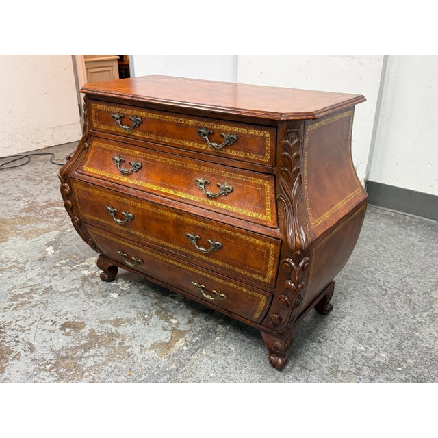 Design Plus Gallery presents a Vintage Bombé Chest of Drawers + Gilt Accents. This four drawer case has a serpentine...