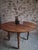 Antique French round dining table dating from the late 19th century, circa 1880–1900. The table is crafted in walnut and...