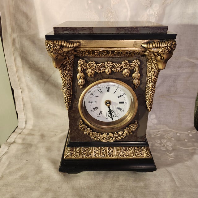 A substantial and highly decorative Neoclassical/Empire Revival mantel clock featuring richly patterned rose breccia...
