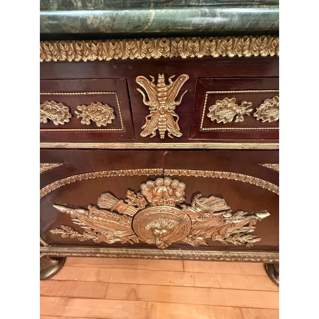 For sale is a gorgeous Italian-style sideboard featuring exceptionally beautiful and unique ormolu metalwork. This stately...