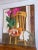 Large still life painting by J. Ross features shellfish, peaches, and an vibrant orchid sitting atop a wooden chair....