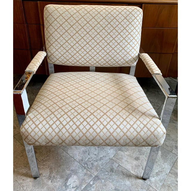 Mid century Milo Baughman chrome lounge chair. Elegant profile with sharp, slanted lines and a low-slung seat with neutral...