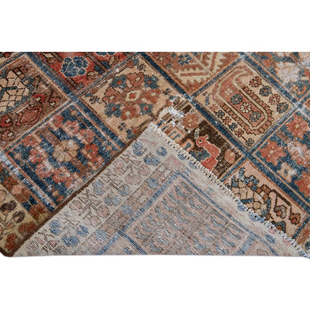 Beautiful Vintage All Over hand-knotted wool rug with a brown field. This rug has blue and orange accents all-over a...