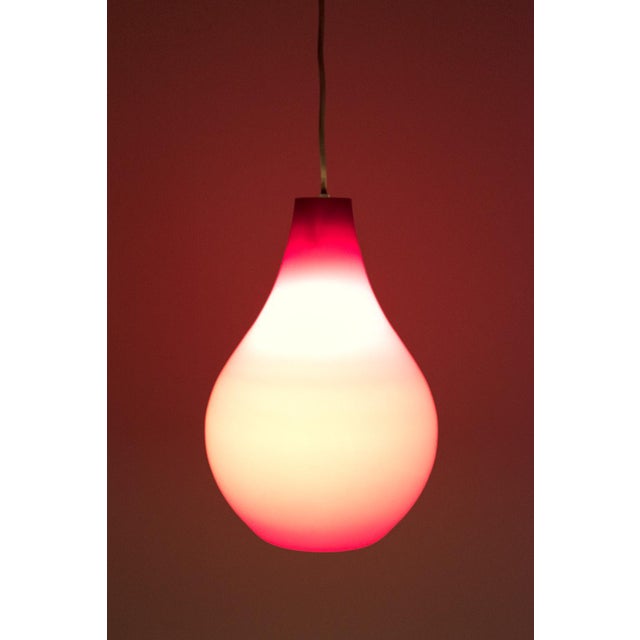 An Attractive Glass Vistosi Pendant Lamp from Italy. The Lamp is in Very Good Vintage Condition. Measurements H. 37 cm; Ø...