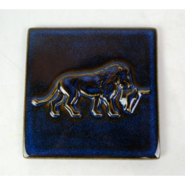 Rosewood box with a patterned blue ceramic lid from around the 1960s.