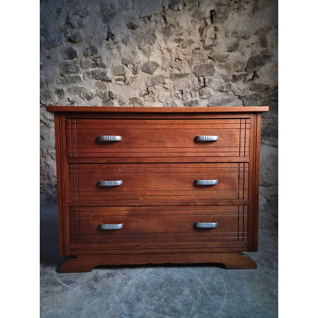 French Art Deco chest of drawers dating from the 1920s–1930s. The chest is predominantly made from oak and has three large...