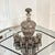 This probable Czech/Bohemian crystal decanter and cordial set was produced in Czechoslovakia during the Mid 20th Century,...