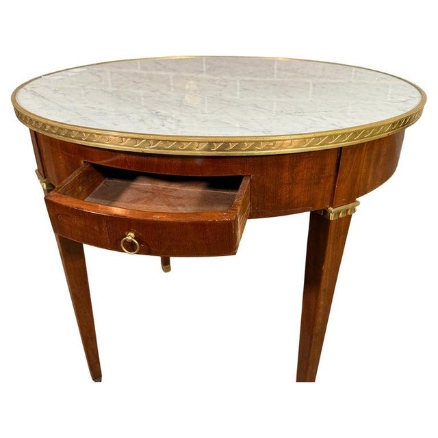 18th Century French Louis XVI Mahogany Table Carrera Marble and Ormolu Mounts. Beautiful Table purchased in France. Age...