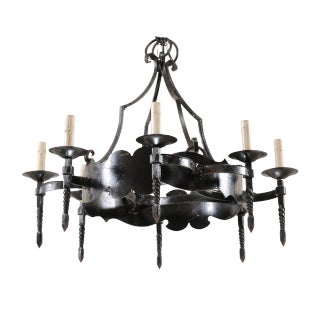 French Mid-20th Century Iron Ring Chandelier With Eight Torch-Shaped Lights For Sale