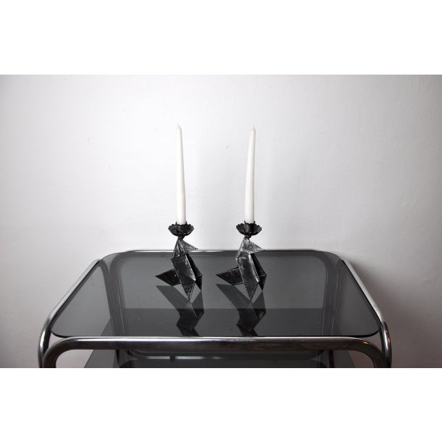 Very beautiful pair of forge candlesticks representing two birds designated and produced in denmark in the 1970s....