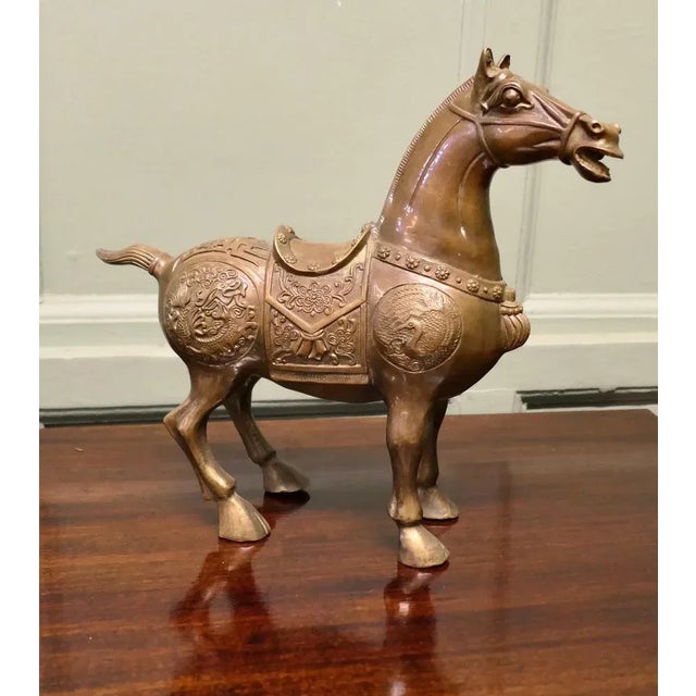 Intricately Decorated Bronze Tang Horse This is a Classic Piece of Chinese Folk Art, superbly cast in bronze, in the...
