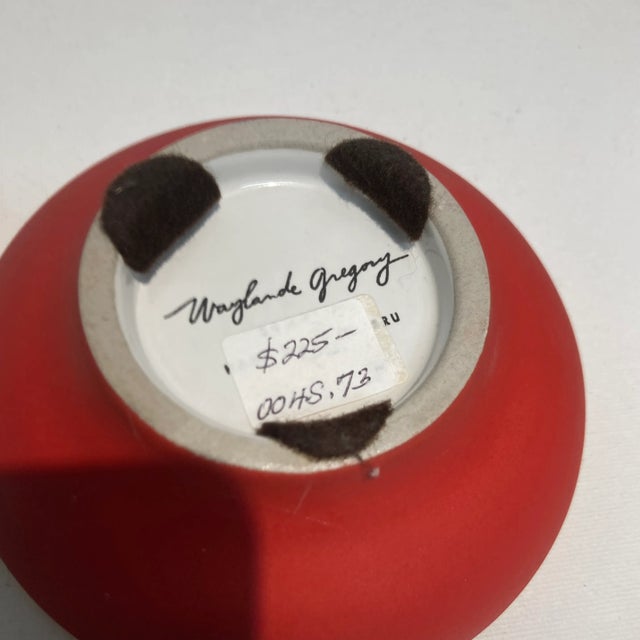 Handmaid in Peru by Wayland Gregory white Buddha trimmed in gold and red.