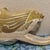This hand-carved and hand-painted wooden mermaid wall sculpture is a classic piece of nautical folk art.