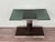 Tv stand or entryway console. made of coated metal and chromed steel with a rectangular smoked glass top. made in italy in...