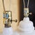 Pair of Vintage White Ceramic Ginger Jar Table Lamps With Floral Relief & Diane Shades For Sale - Image 14 of 18