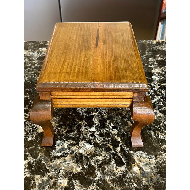 What an adorable little stand! Handcrafted by Stan Swinehart in 1988 and made out of a very solid and sturdy hardwood— the...