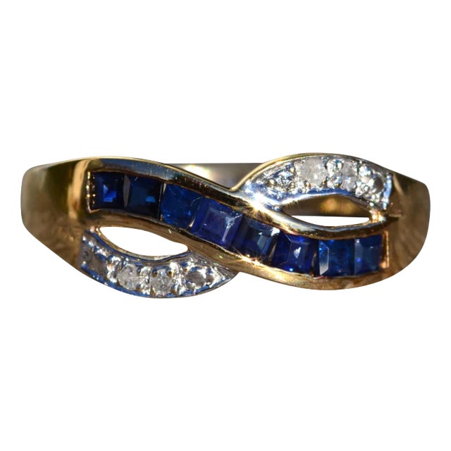 The Lobelville: Ladies Yellow Gold Diamond and Sapphire Crossover Ring For Sale