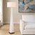 This Striking Contemporary Floor Lamp Features A Sleek, Tapering Form Crafted From Frosted White Acrylic. The Modern...