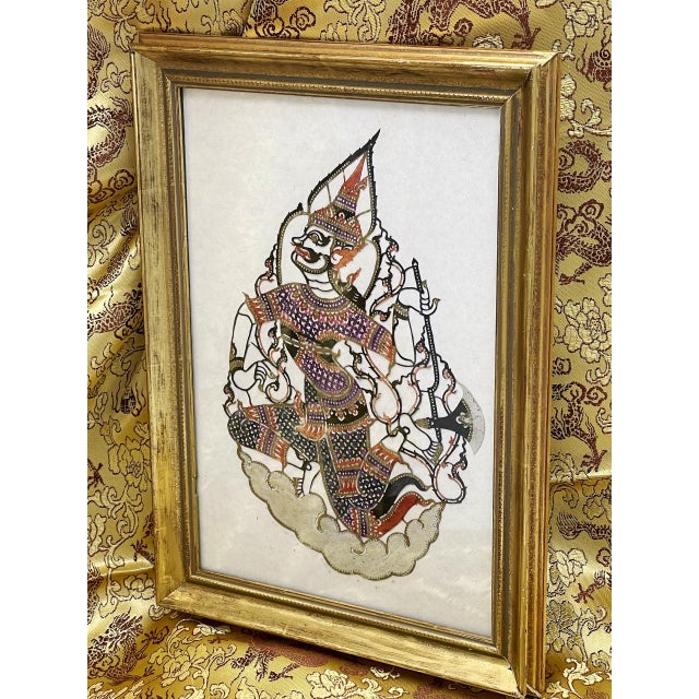 Folk Art Fine Indonesian Hand-Coloured Pierced Leather Deity, Gilt-Framed Wayang Shadow Art Under Glass For Sale - Image 3 of 10