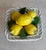 Vintage Italian ceramic centerpiece in the form of a footed basket filled with lemons. The bowl is hand-woven from ropes...