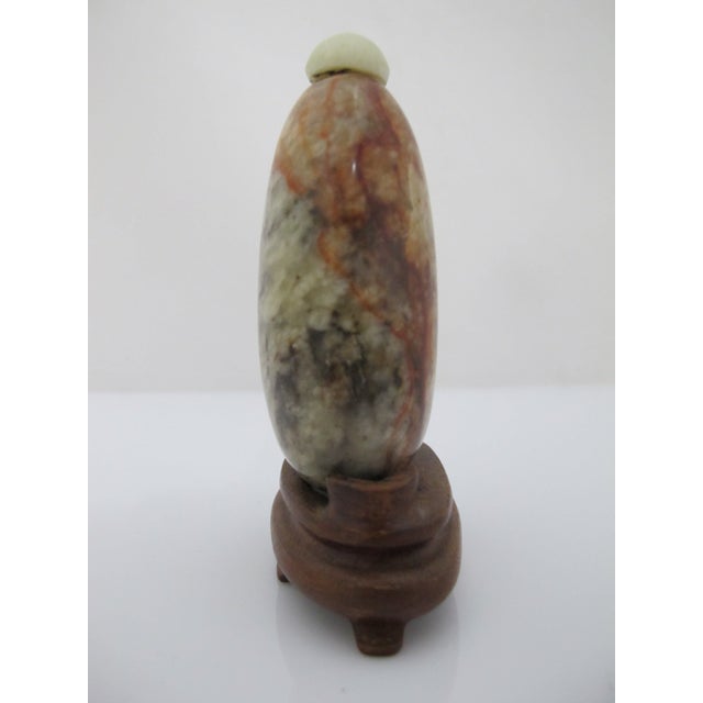 Early 20th Century Chinese Pebble Form Russet Jasper Snuff Bottle on Carved Wood Stand For Sale - Image 5 of 8