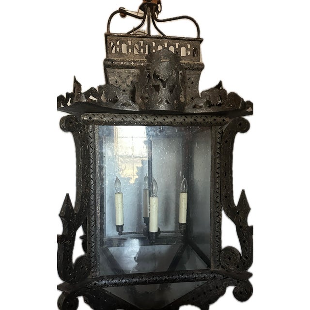 This antique Gothic Medieval Spanish Revival pierced metal electric lantern is large, 64" in length and 27" in width, with...