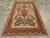 An antique Turkish Sivas accent rug handmade during the early 20th century with a pictorial design of the 'Royal Coat of...
