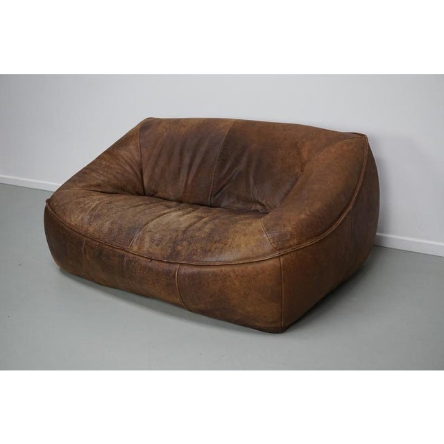 This stunning leather sofa was made in the Netherlands around the 1970s and designed by Gerard van den Berg. It is very...