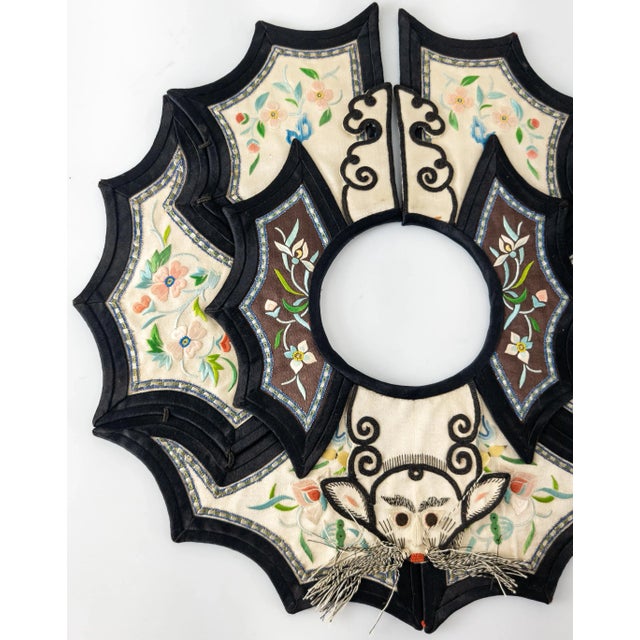 We are selling this Chinese silk embroidered robe collar. This collar was probably for a Child based on the size and is...