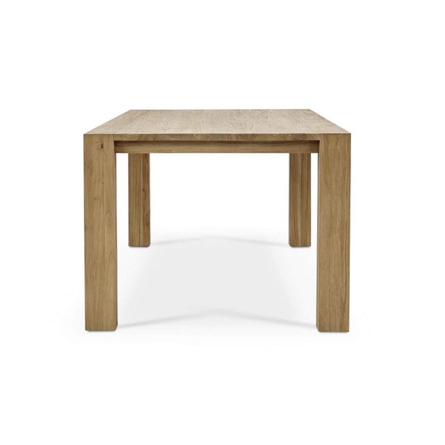 The rustic dining table brings warmth and natural beauty to your dining area. Made from solid teak wood with a natural...