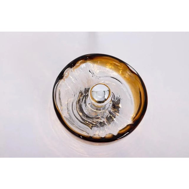 A wonderful round murano glass flush mount or wall light manufactured by kaiser leuchten in germany 1970s. Thickly murano...