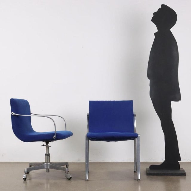 Group of chairs, including 1 with armrests and swivel, aluminum frames, foam and fabric upholstery. The height adjustment...