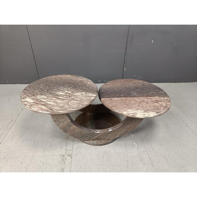 Timeless marble coffee tables with two round tops. Beautiful arched base and attractive natural vains in the stone. Good...