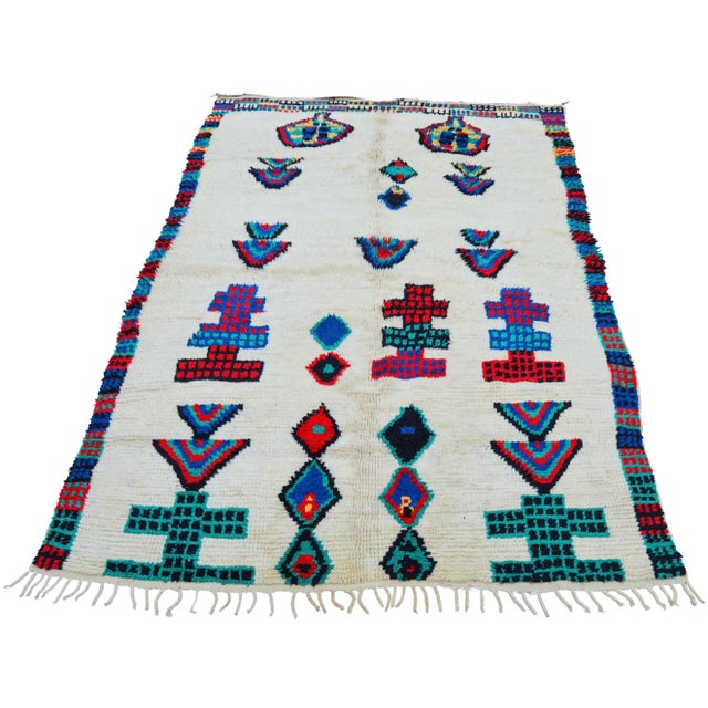 One-of-a-kind rug hand-knotted in the High Atlas Mountains of Morocco with soft organic wool. Featuring an ornate rhythmic...