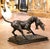 Striking in scale and full of movement, this late 19th century sporting sculpture depicts a hunting dog proudly carrying a...