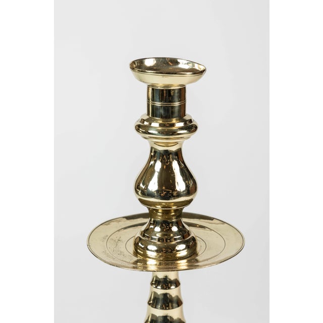 Large newly polished brass candleholder with beehive pattern stem and base, and simple wax catcher detail, circa 1850-1900.