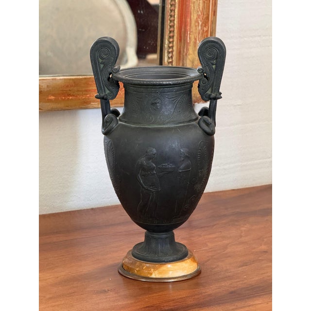 19th century Italian Grand Tour urn in the classical volute krater form, with tall scrolled handles that loop down to the...