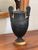 19th century Italian Grand Tour urn in the classical volute krater form, with tall scrolled handles that loop down to the...