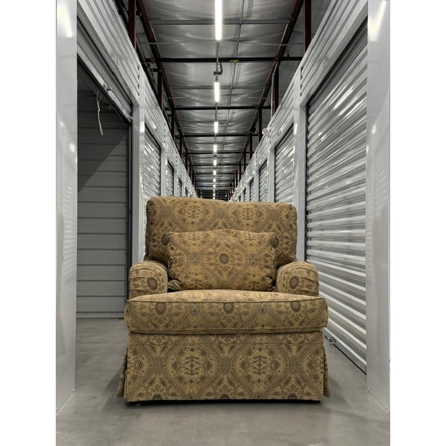 Elegant upholstered chair, superbly crafted by Highland House. Featuring warm neutral patterned upholstery. Comfortable...