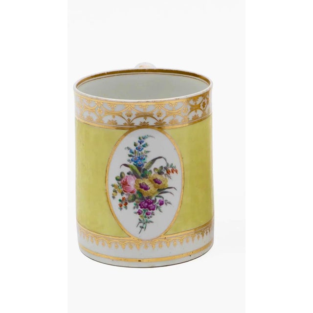 Antique early 19th century Georgian Chamberlains Worcester yellow ground mug. Decorated with oval panels of hand painted...