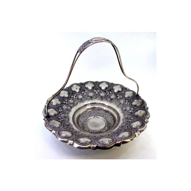 Silver Fruit Bowl with Floral Motifs, in Very Good conditions. Designed before 1890 This piece has an attribution mark, I...