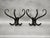 Pair of sculptural bentwood wall hooks produced in Czechoslovakia during the 1940s–1950s. Expertly crafted from bent beech...