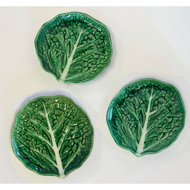 Vintage cabbage leaf appetizer plates in the style of Bordallo Pinheiro. Set of 3. Made in Portugal. Age wear.