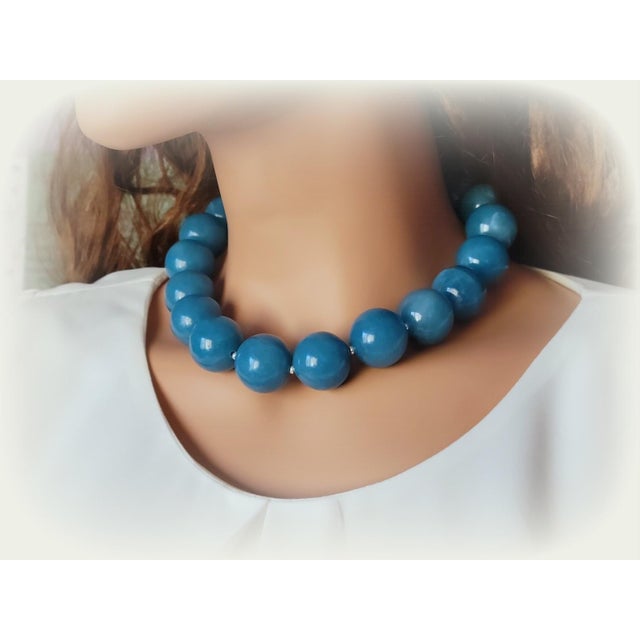 Make a statement with this impressive Blue Sponge Quartz Necklace, handcrafted from exceptionally large 24 mm natural blue...