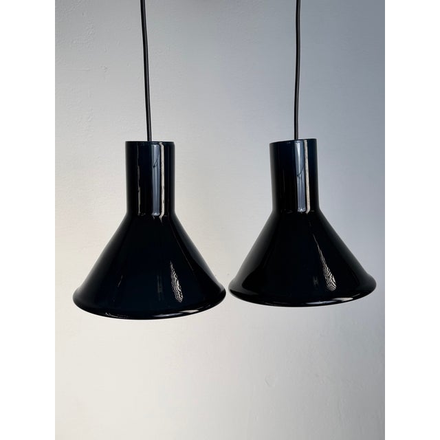 Beautiful pair of holmegaard mini p&t pendant lamps, designed by michael bang – an excellent example of danish design...
