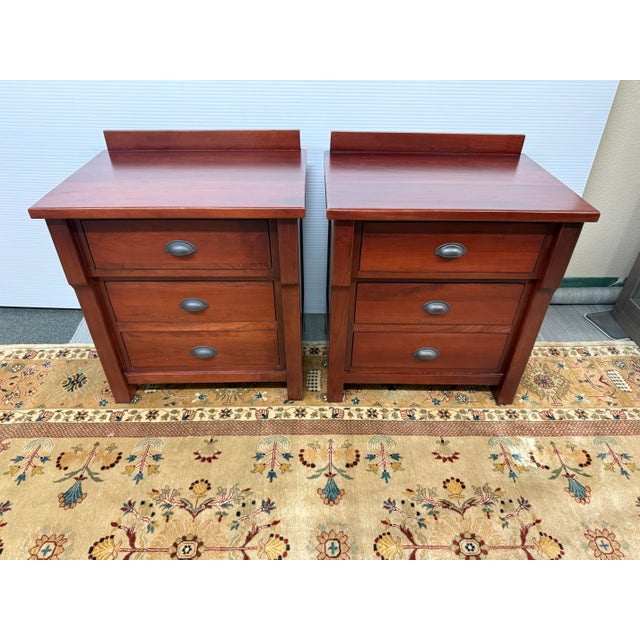 Design Plus Gallery presents a Pair of Nauvoo Bedroom Collection Nightstands by Stuart David. These bedside tables are...