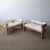 c. 1970s, signed. Both have been fully refinished and reupholstered in Maharam Hearth with new foam. There is still age-...