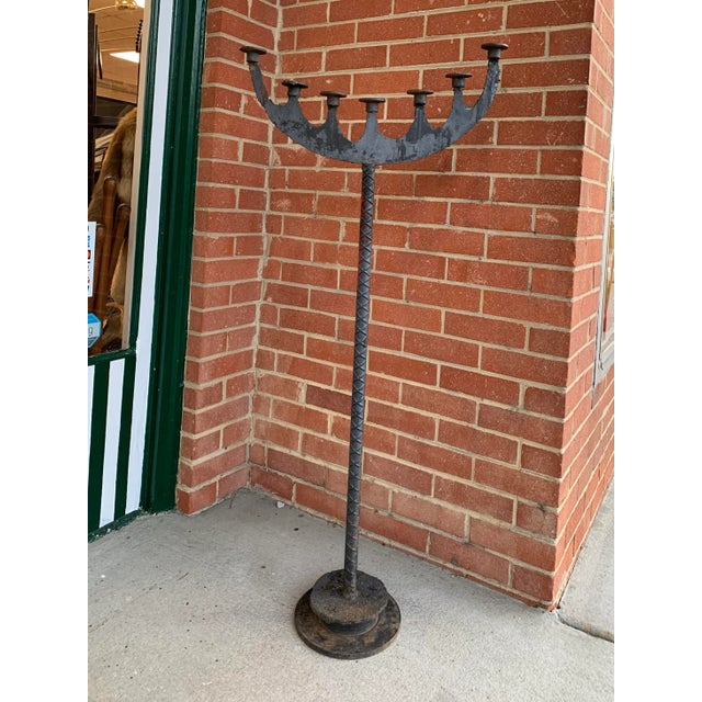 Striking brutalist sculptural artisan made torched steel and iron standing floor candle holder. Made entirely from...
