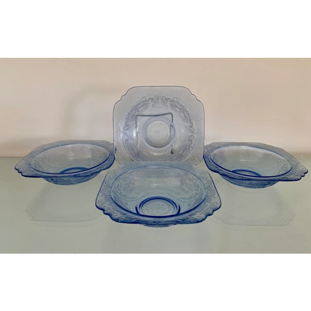 Deep azur depression glass, 4 rimmed soup bowls in blue pattern. These are discontinued depression glass pieces in the...